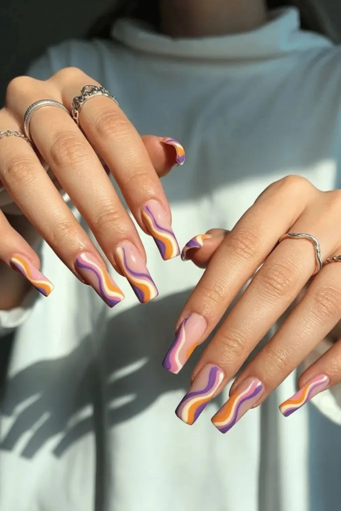Retro Swirl Purple And Orange Nails