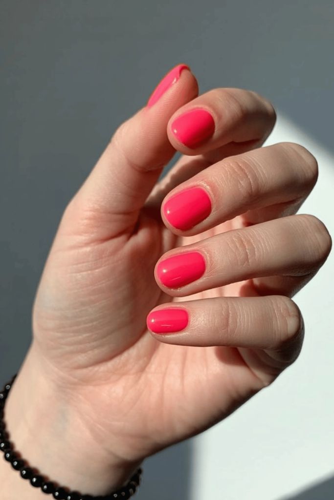 Vibrant Coral Pink Glossy Nails
