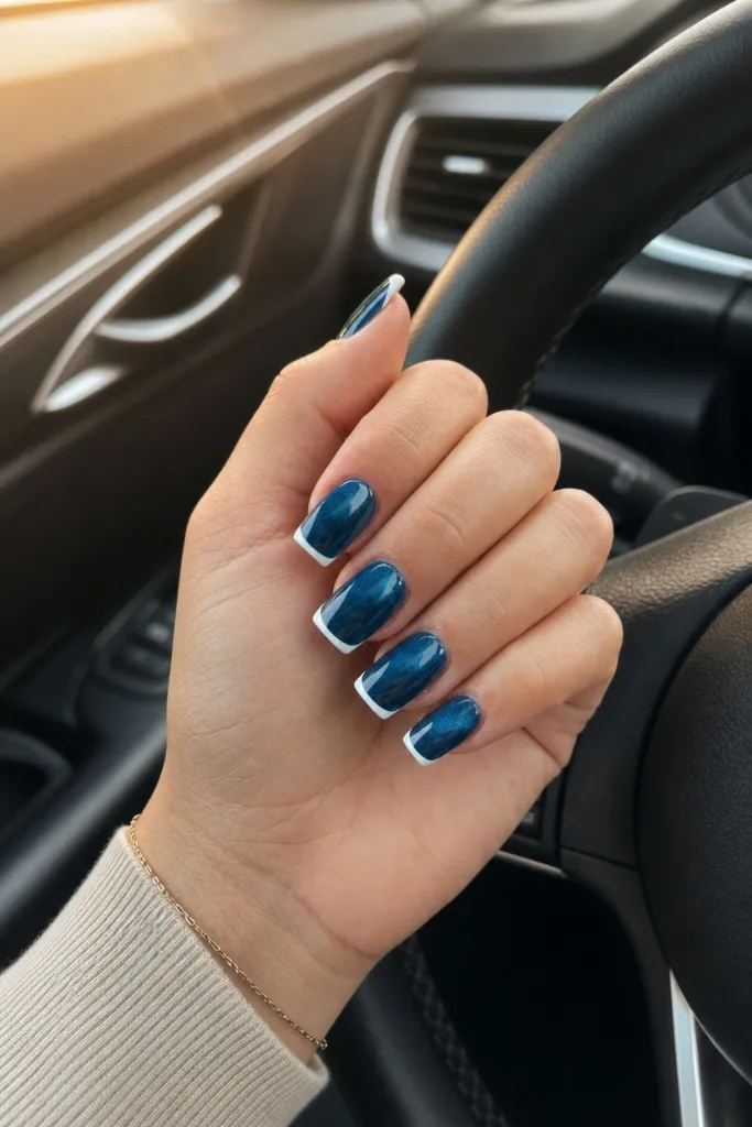 Denim Wave French nails for summer. Summer vibes nails 2026 in marbled blue with white tips.