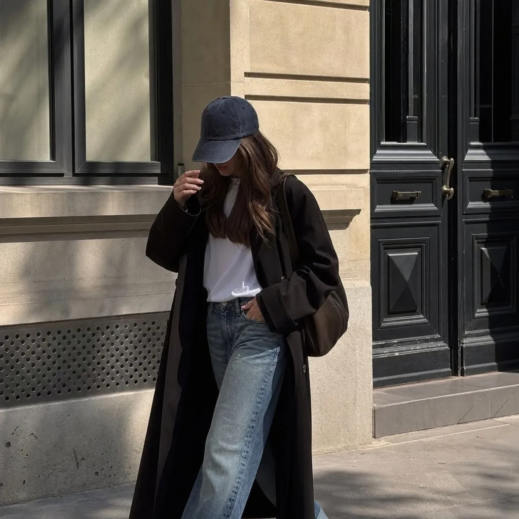 Black long coat with jeans and white tee