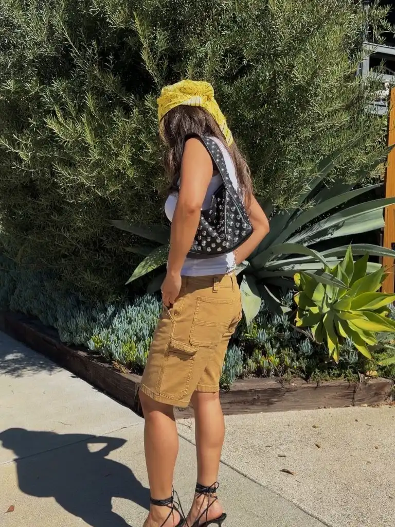 Yellow bandana with cargo shorts and studded bag