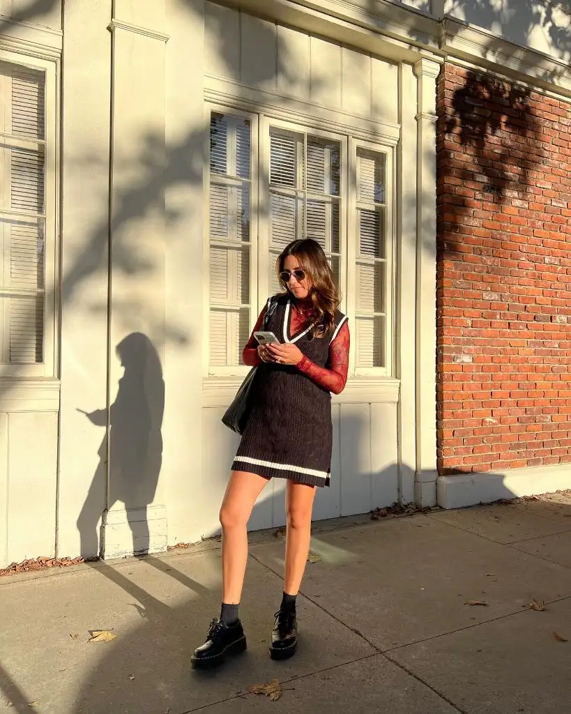 Dark sweater vest dress with platform boots