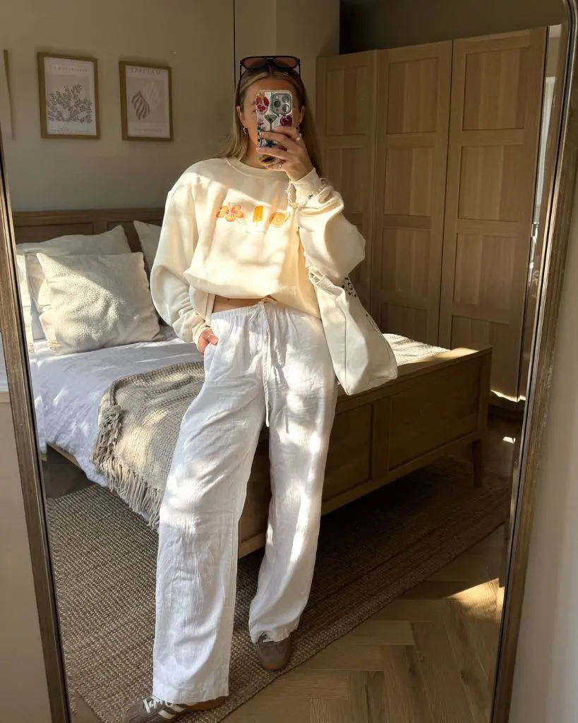 Cozy cream cropped sweatshirt with white linen pants mirror selfie outfit
