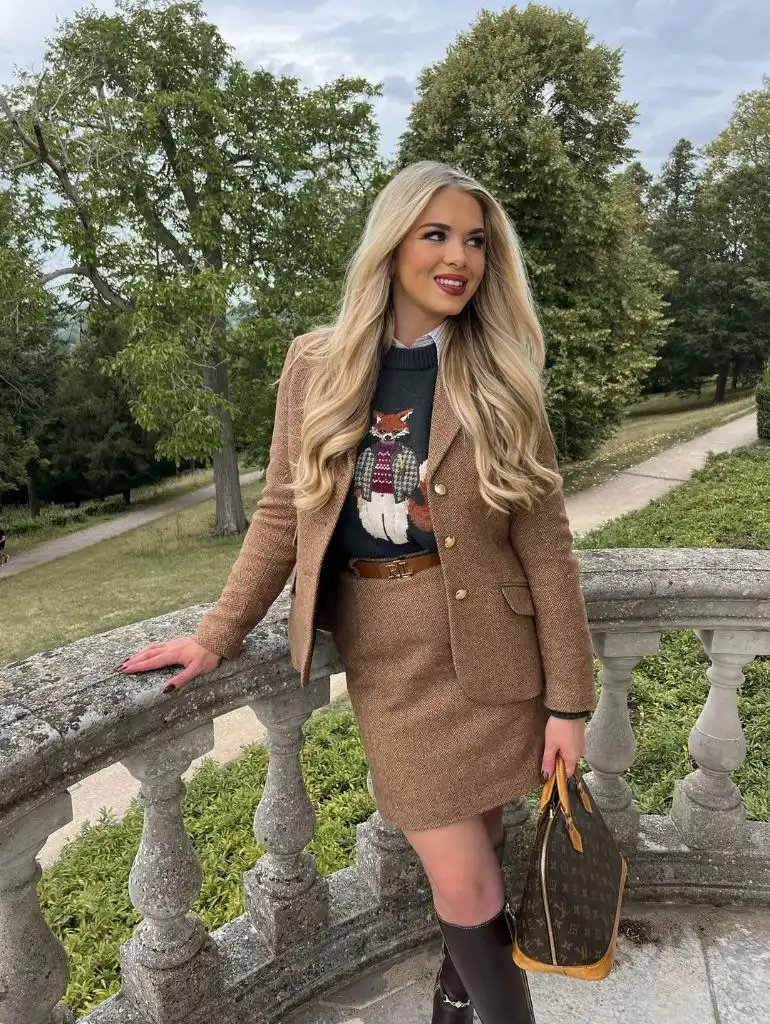 Tan tweed blazer and skirt suit with fox sweater and Louis Vuitton bag