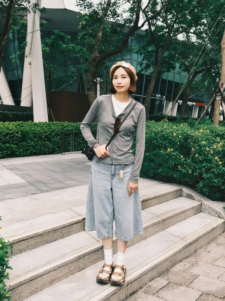 Grey cardigan over white tee, denim culottes, sandals and beret