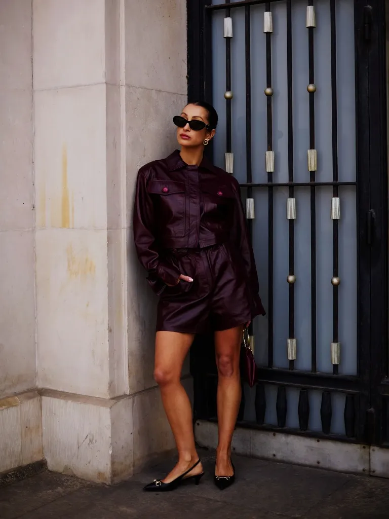 Deep burgundy leather jacket and shorts set with kitten heels