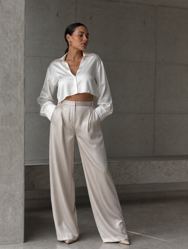 Cream satin cropped shirt with ivory wide-leg trousers