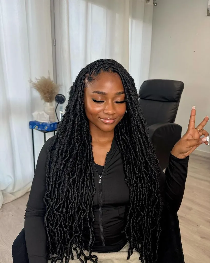 Locs Hairstyles for Black Women Distressed Black Faux Locs With Boho Texture