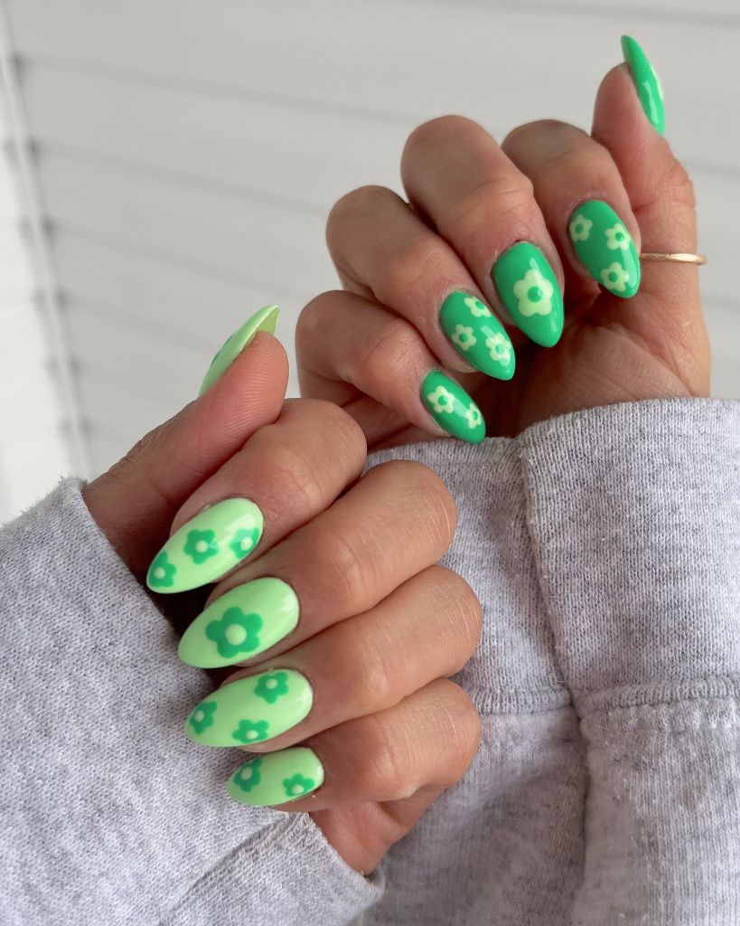 Green retro flower pattern almond nails, fun August nails idea 2026