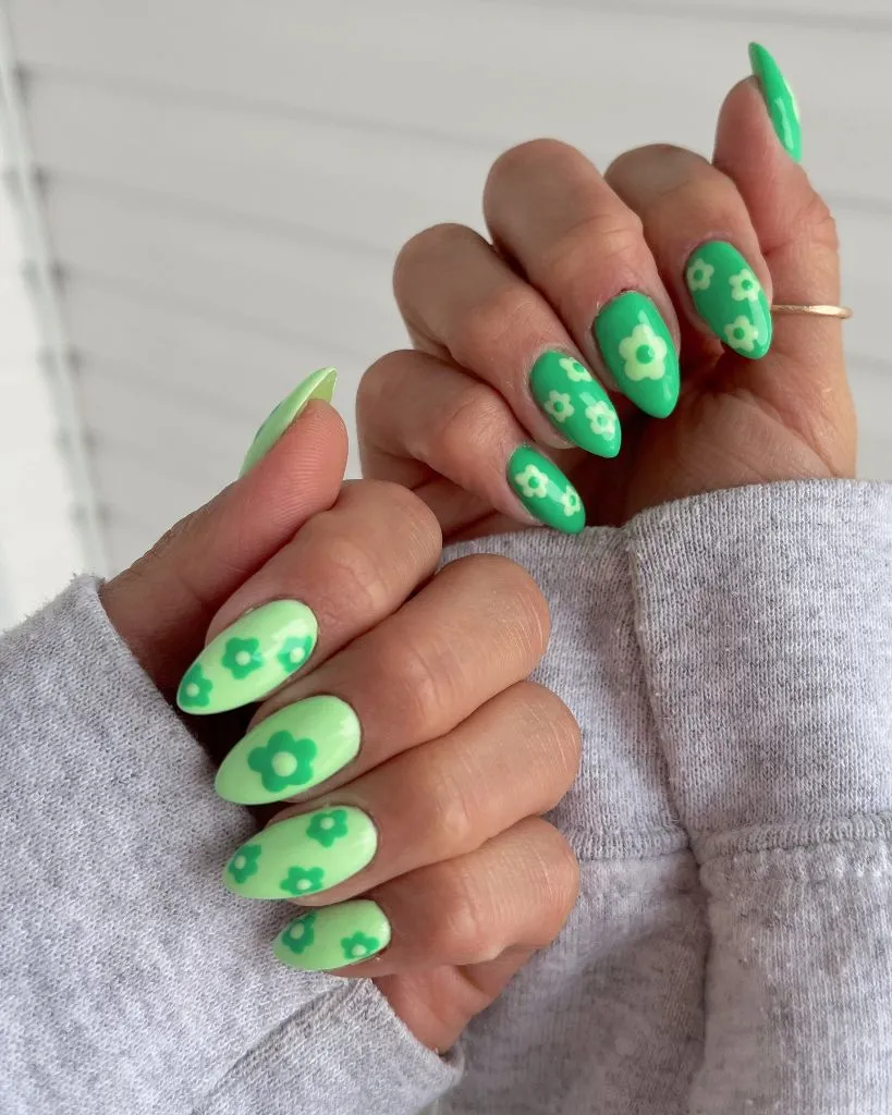 Green retro flower pattern almond nails, fun August nails idea 2026