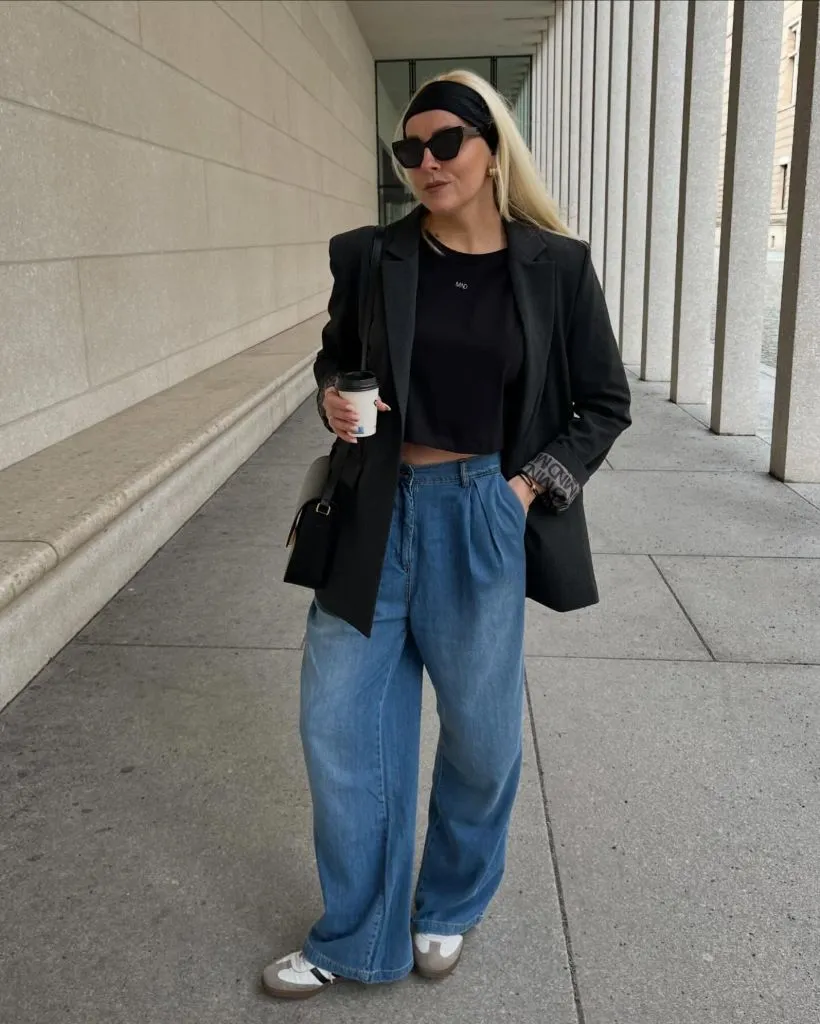 Fall professional outfit black blazer wide-leg jeans headband sneakers coffee