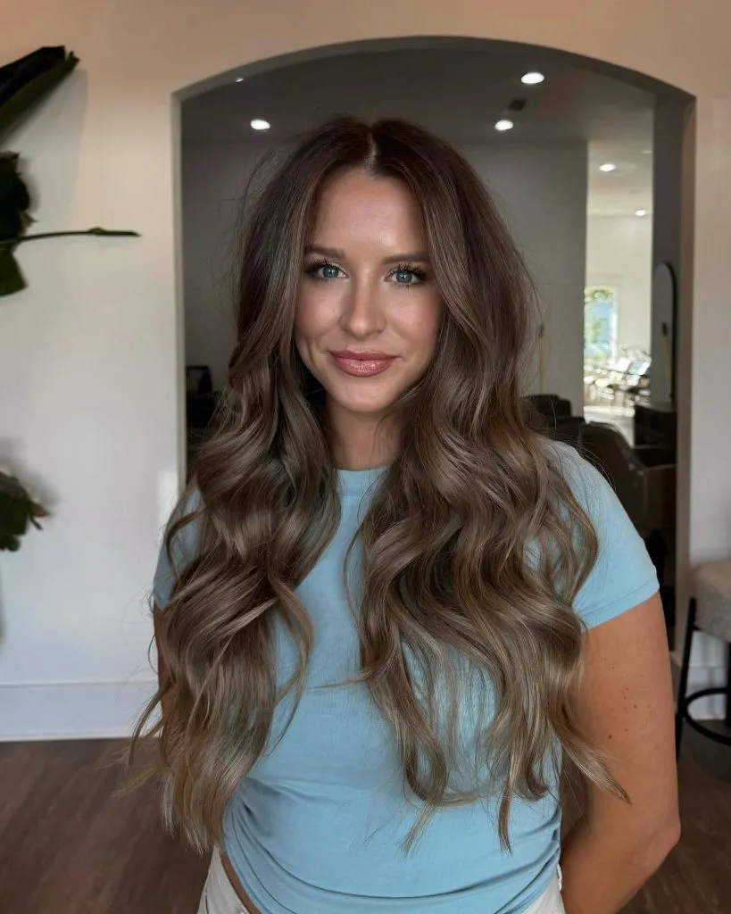 Fall Hairstyles for Long Hair 2026 Glossy Milk Chocolate Waves With Cashmere Shine