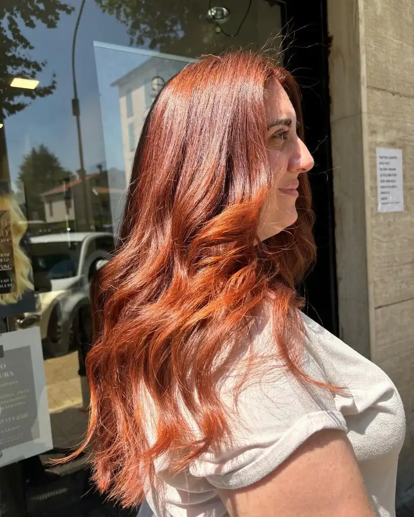 Fall Hairstyles for Long Hair 2026 Warm Copper Waves With Sun-Kissed Dimension