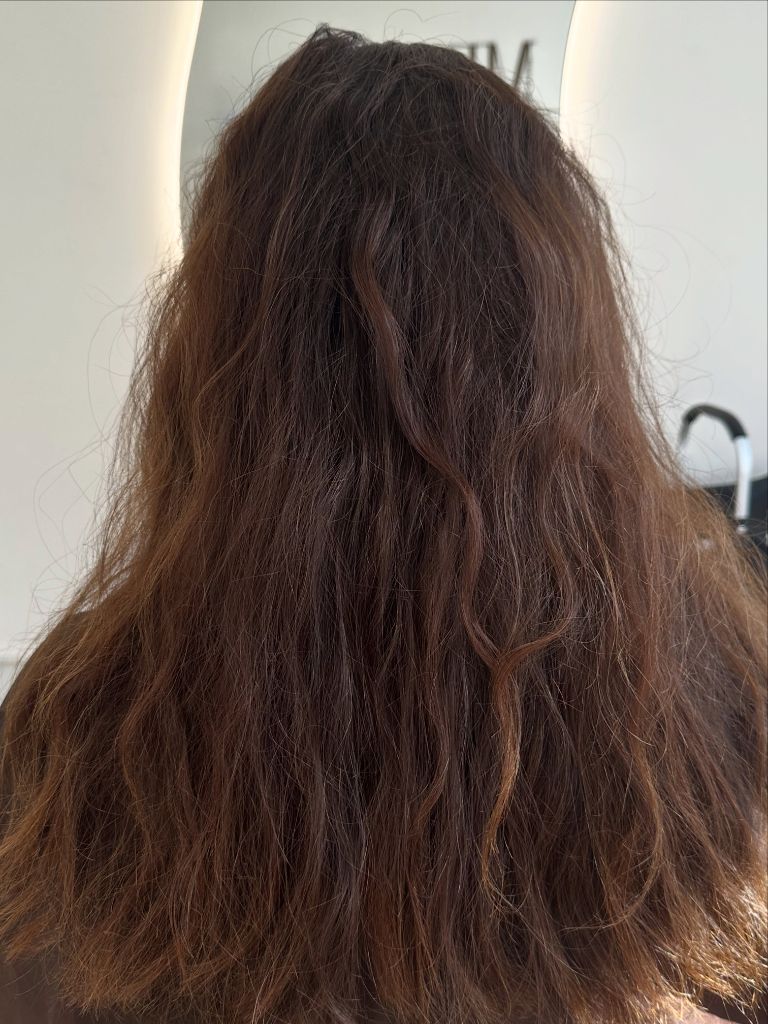 Fall Medium Haircuts 2026 Textured Medium Brunette with Natural Movement
