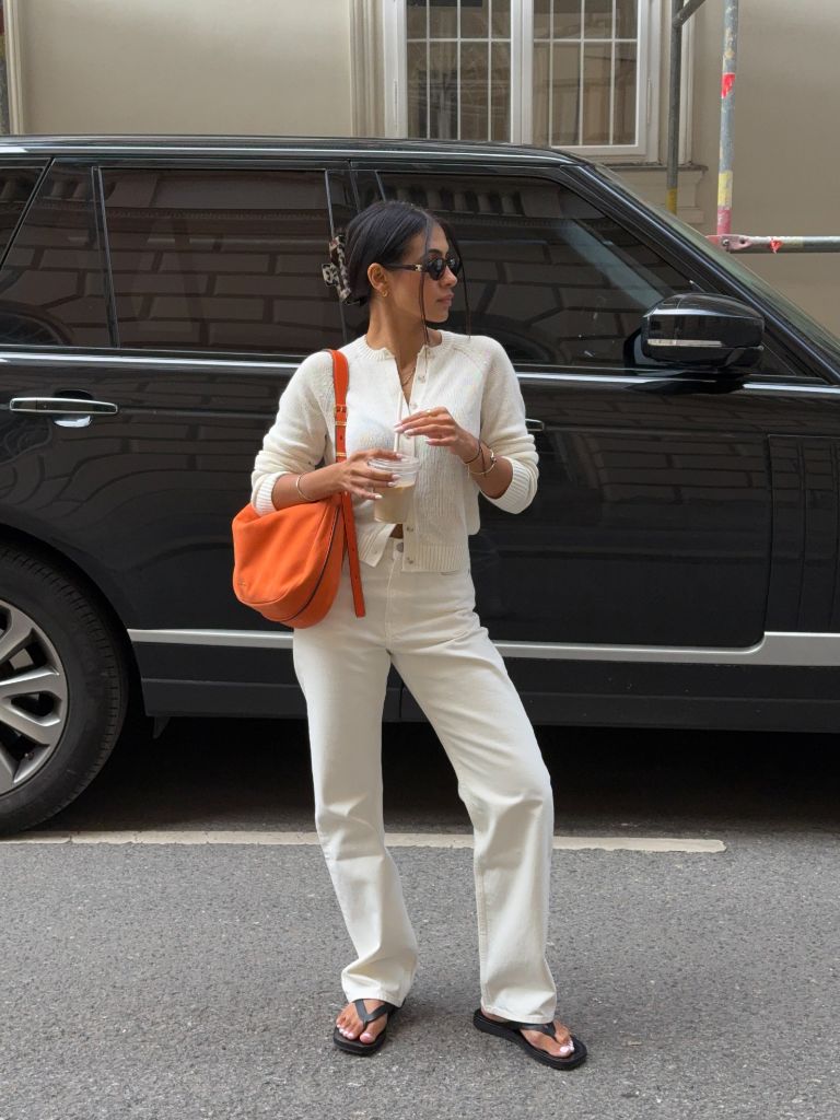 All-cream outfit with orange bag