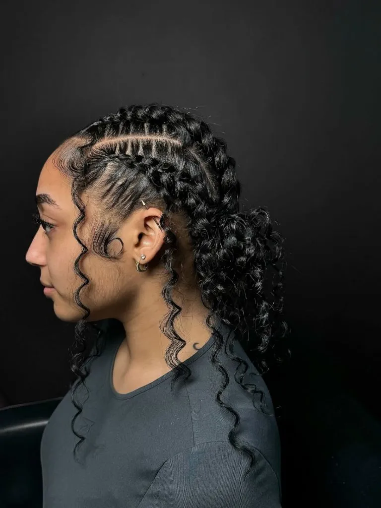 Butterfly Braids Hairstyle Cornrows into a Curly Bun with Spiraling Baby Hairs