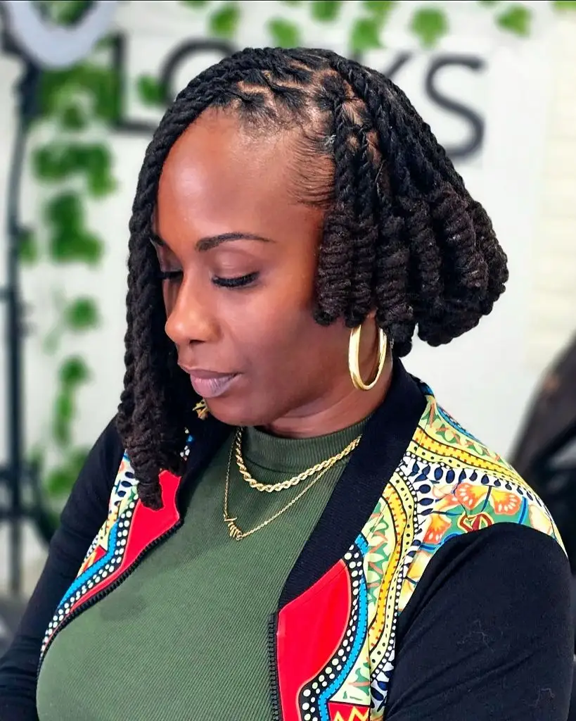 Locs Hairstyles for Black Women Sculpted Black Bob With Curled Under Ends
