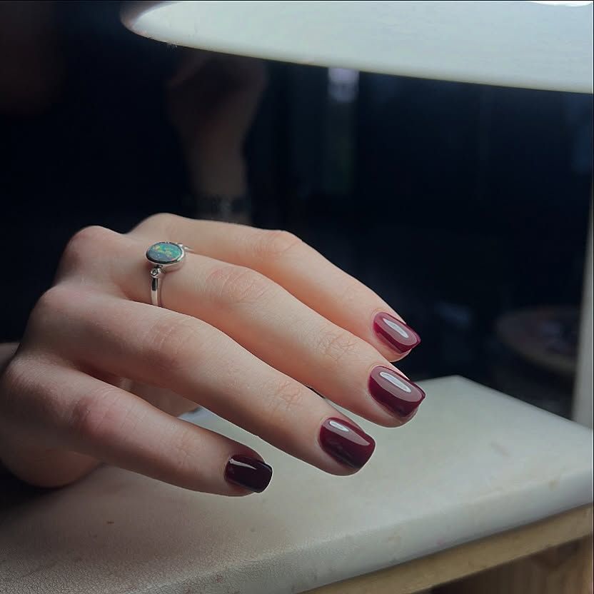 Deep burgundy glossy square nails, moody August nail idea 2026