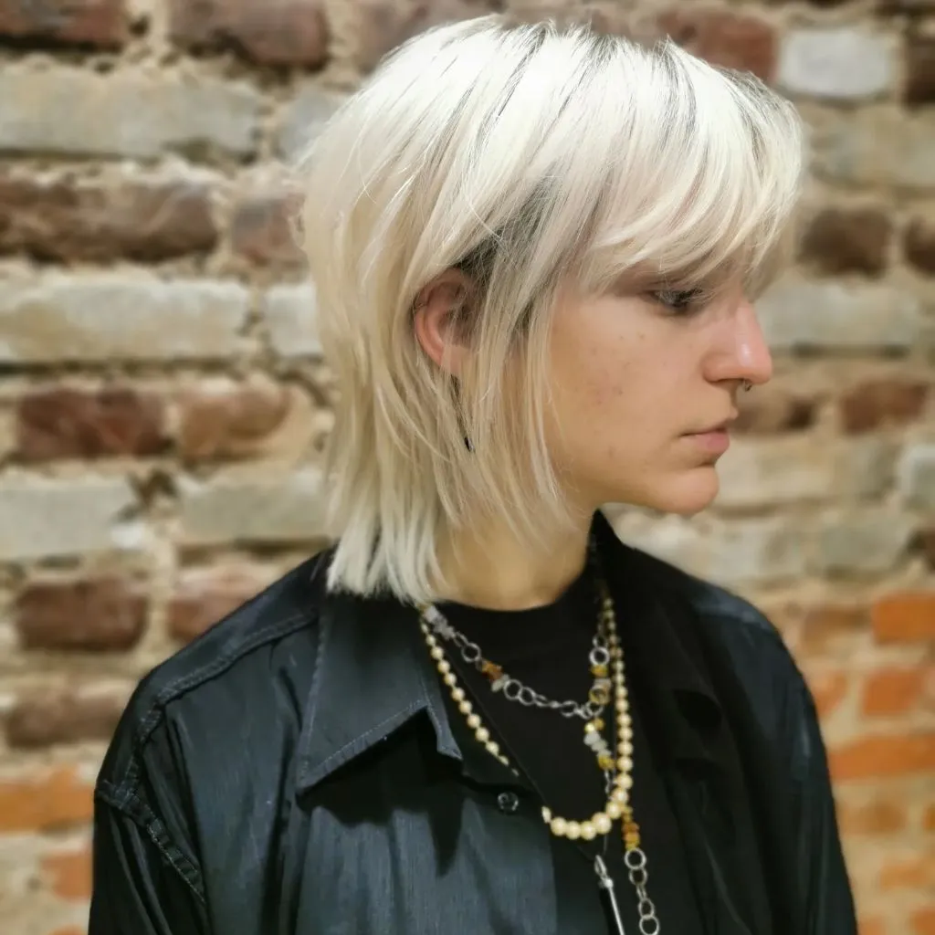 Fall Short Haircuts 2026 Platinum Choppy Bob with Heavy Textured Bangs