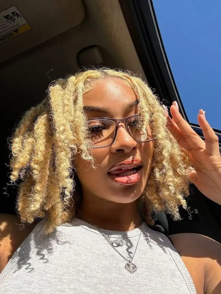 Locs Hairstyles for Black Women Golden Blonde Curly Loc-Out With Bounce