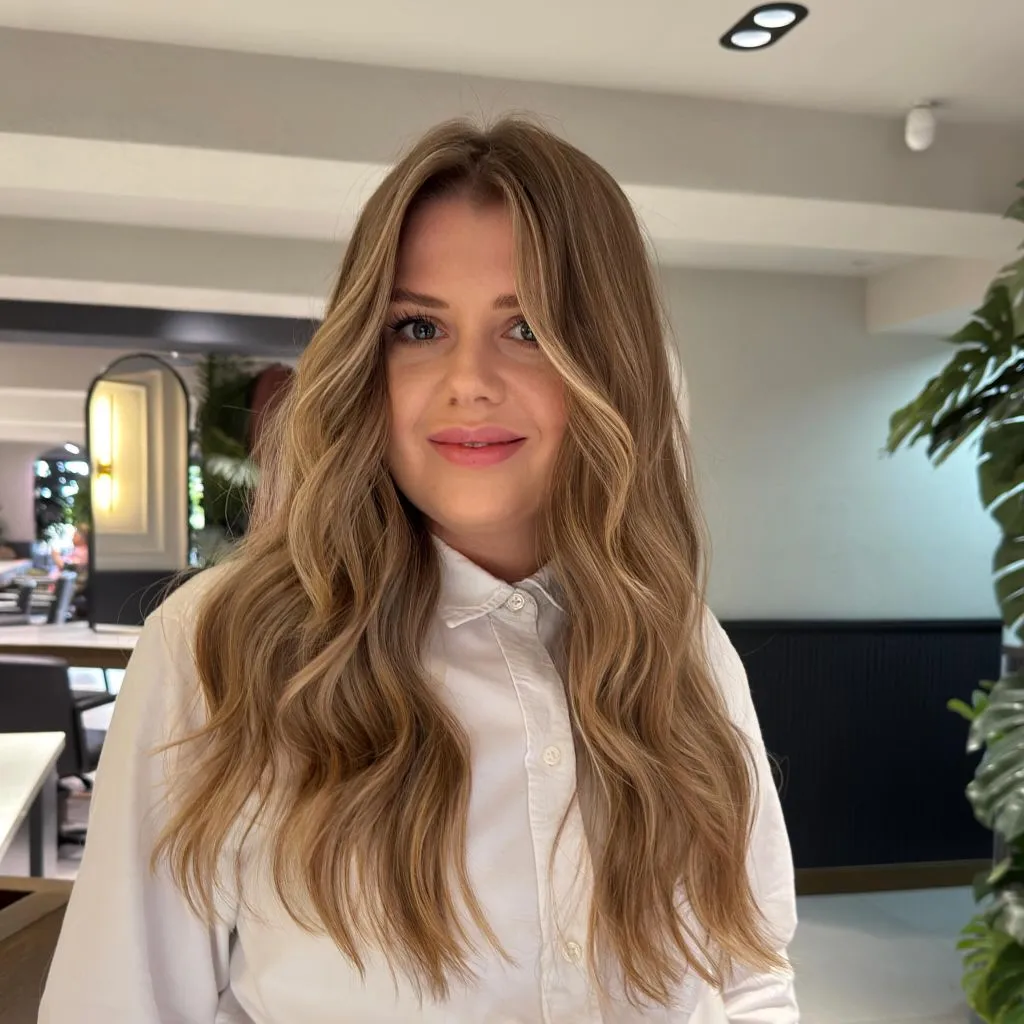 Fall Medium Haircuts 2026 Soft Caramel Balayage on Long Undone Waves