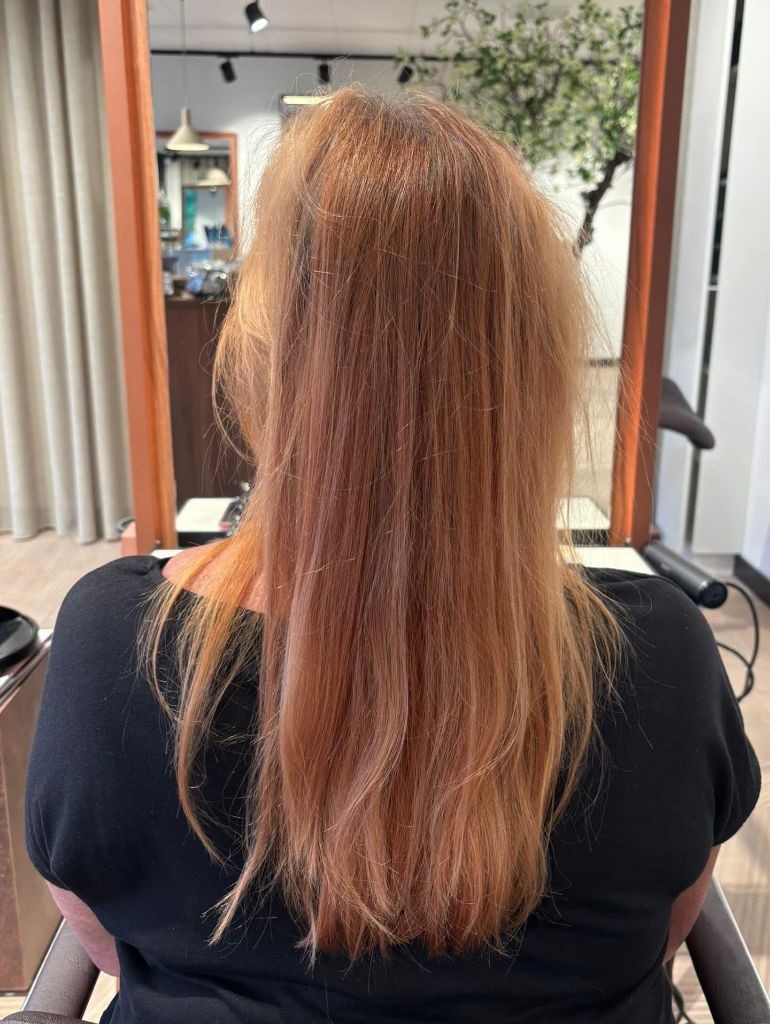 Fall Haircuts for Women 2026 Warm Strawberry Blonde with Lived-In Softness and Long Layers