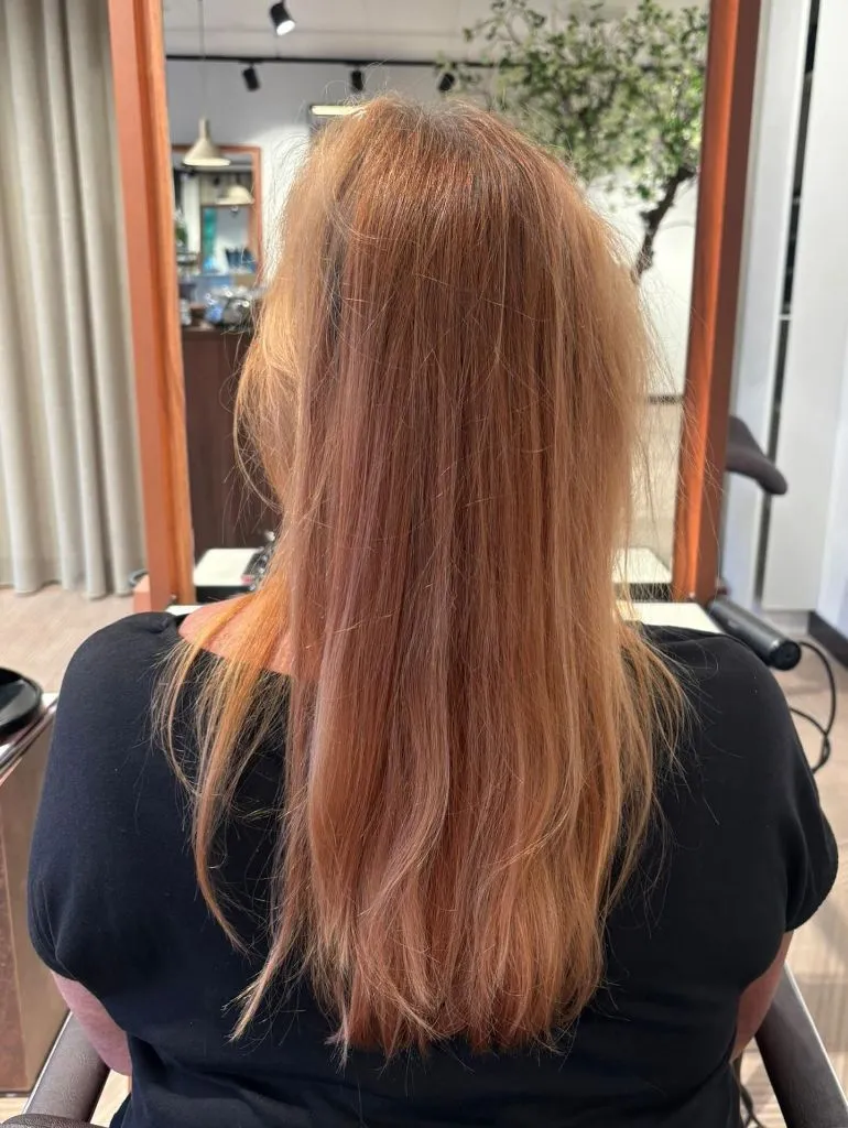 Fall Haircuts for Women 2026 Warm Strawberry Blonde with Lived-In Softness and Long Layers
