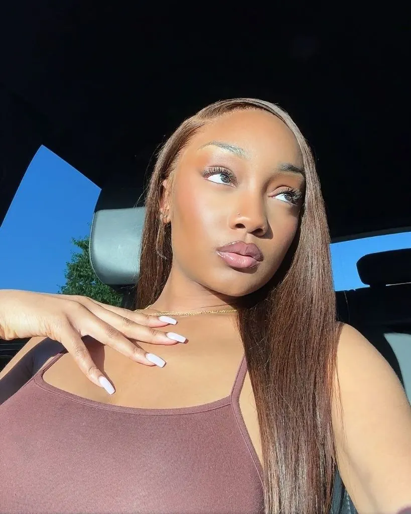 Fall Hair Colors for Black Women 2026 Warm Honey-Brown Straight Hair With Sun-Drenched Dimension