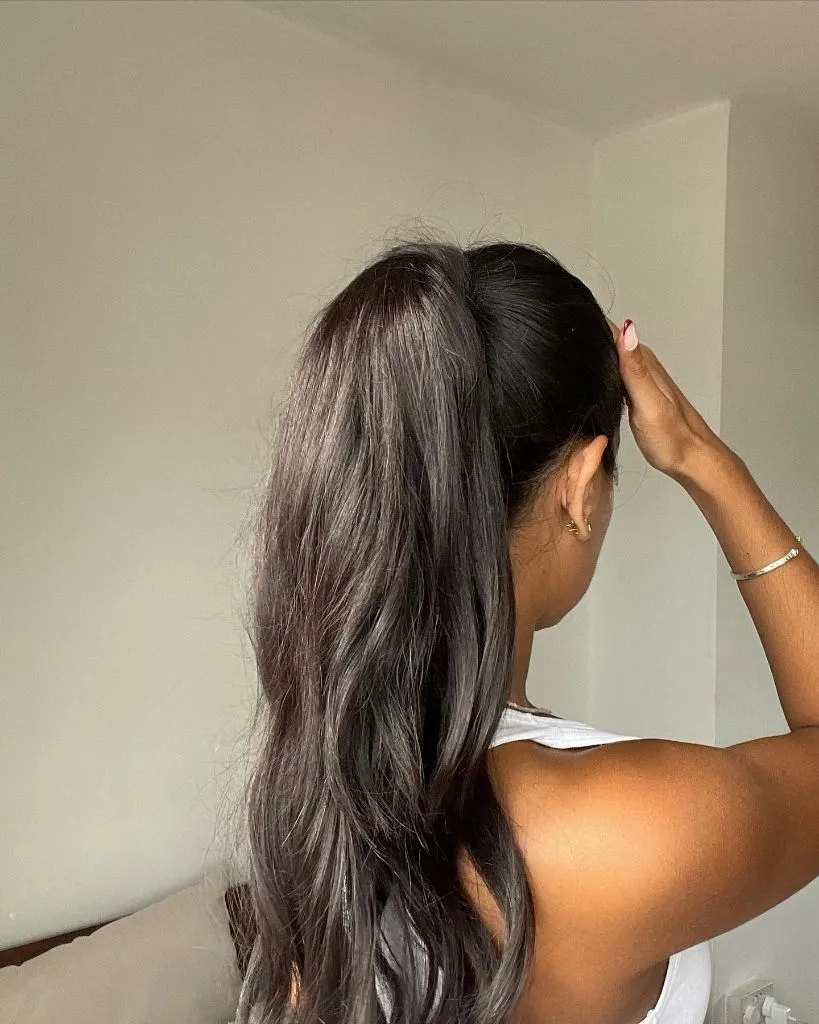 Fall Hairstyles for Long Hair 2026 High Wavy Ponytail in Cool Charcoal Brunette