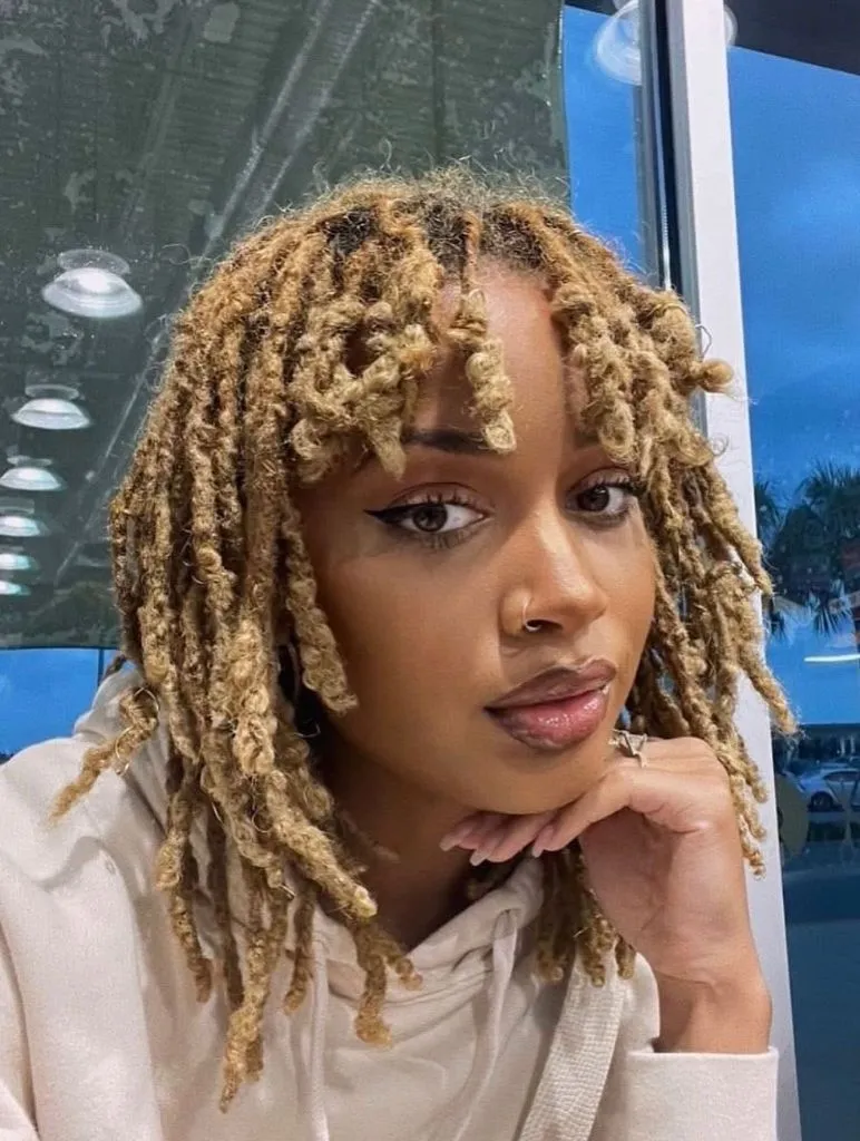 Locs Hairstyles for Black Women Textured Blonde Bob With Soft Coiled Tips
