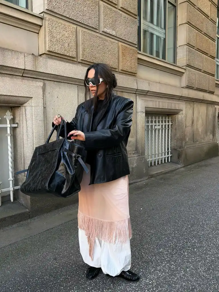 Leather blazer and fringed skirt