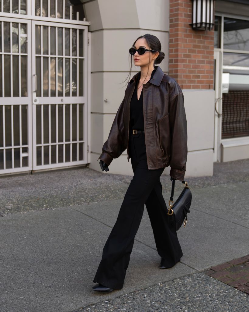Brown leather bomber with black outfit