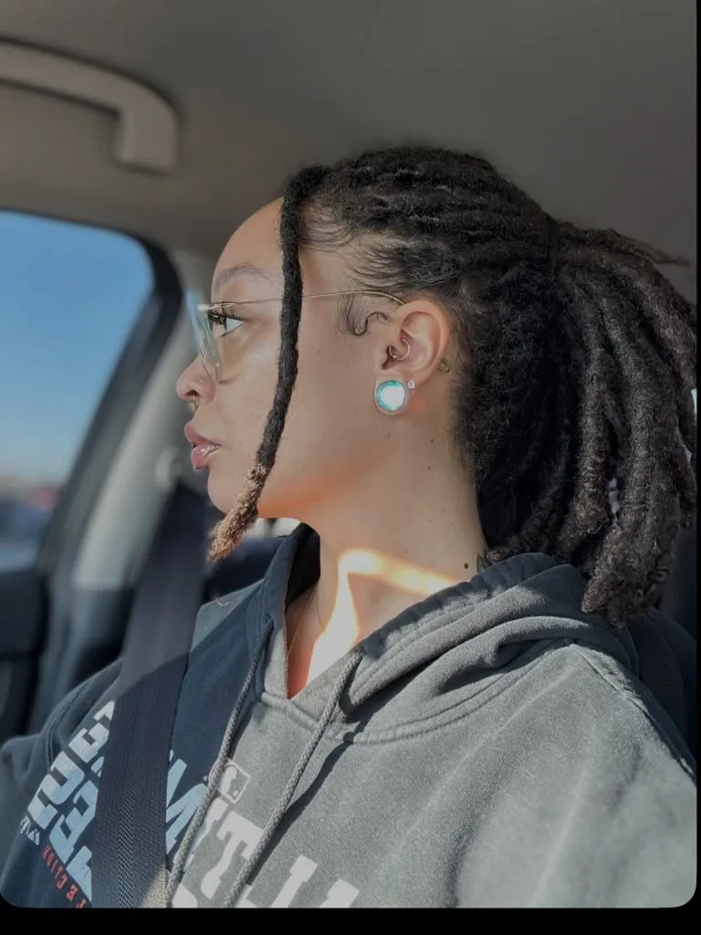 Locs Hairstyles for Black Women Half-Up Locs With Soft Face-Framing Pieces