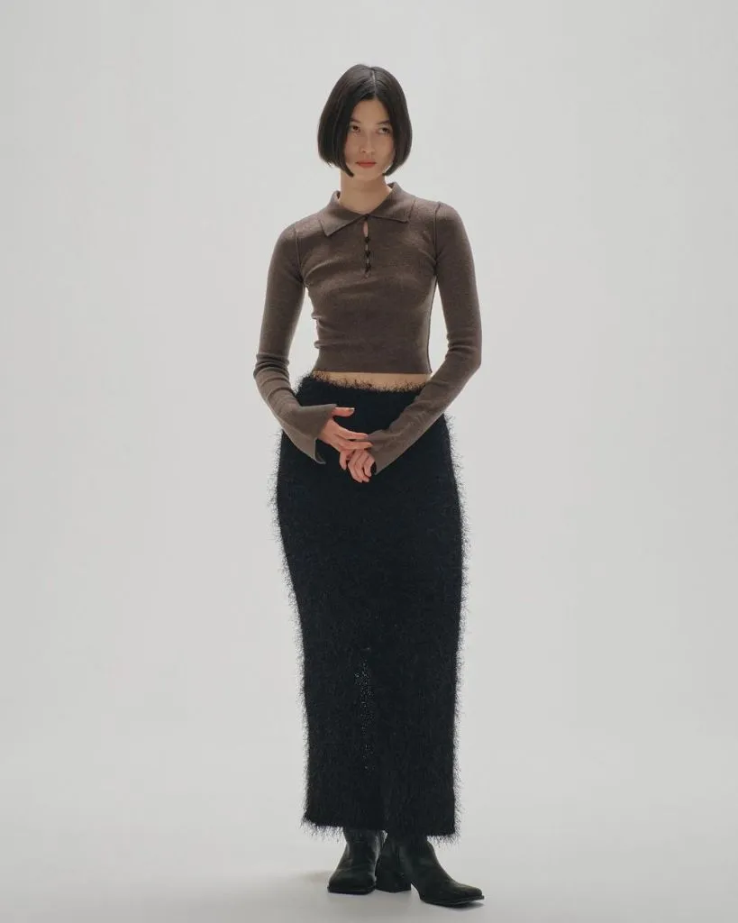 Black fuzzy knit midi skirt with brown collared knit top and boots