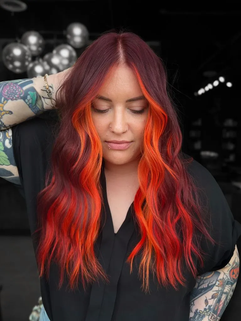 Dark base with vivid orange and red peekaboo panels