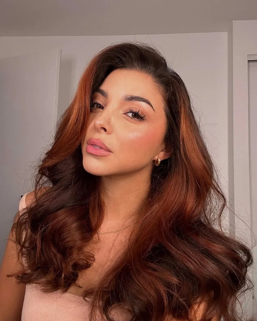 Fall Hairstyles for Long Hair 2026 Warm Cinnamon Copper With Voluminous Blowout Waves