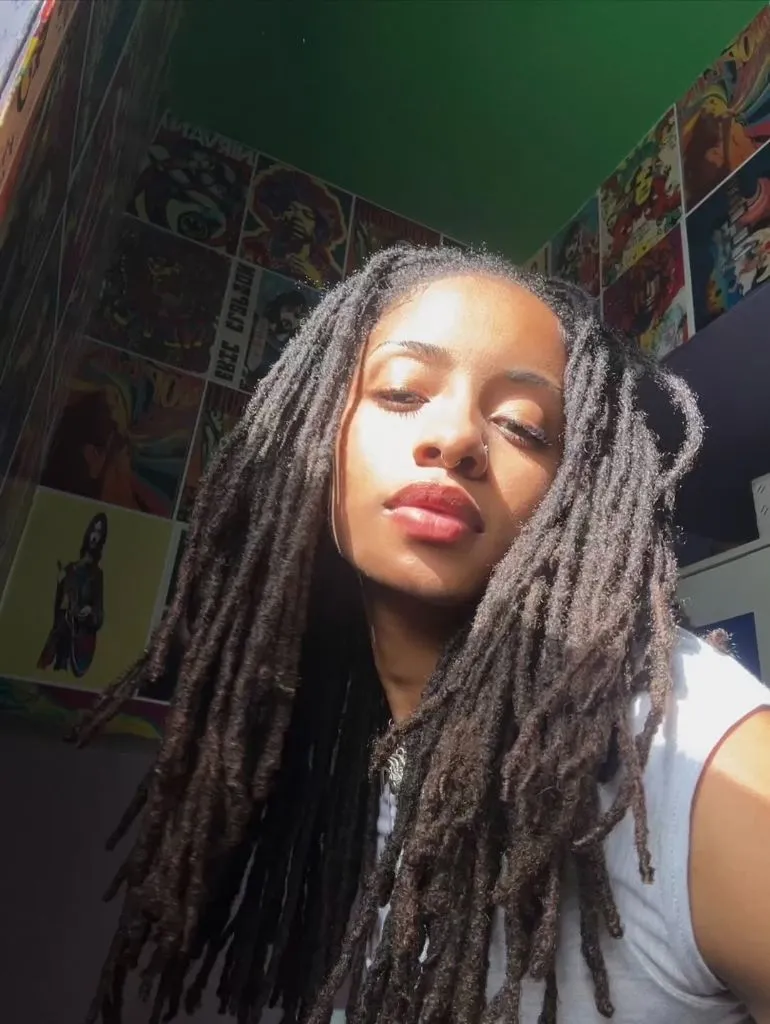 Locs Hairstyles for Black Women Long Layered Locs With Natural Movement