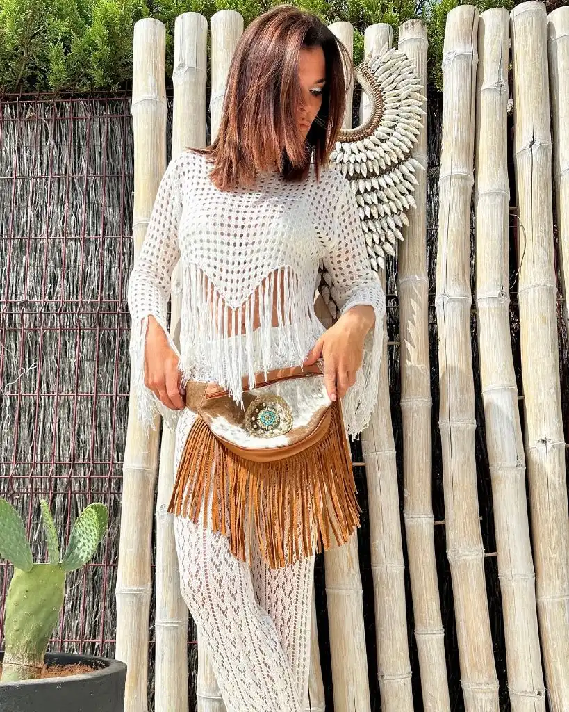 White crochet outfit with fringed leather belt bag
