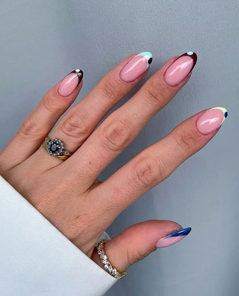Colorful abstract French tip nails with multi-color tips, playful August nails ideas 2026