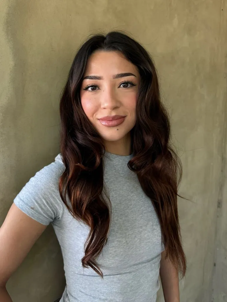 Fall Medium Haircuts 2026 Long Dark Brunette Waves with Auburn Warmth