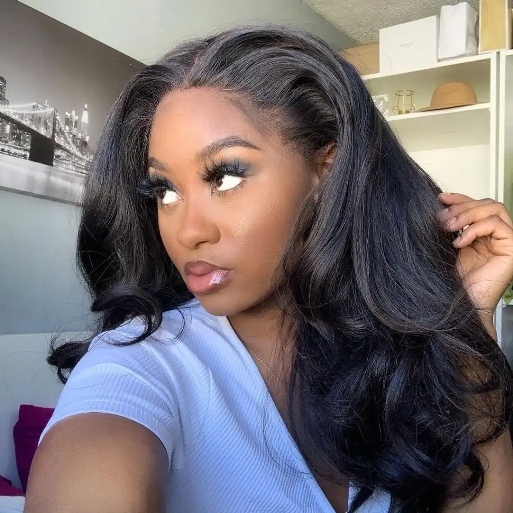 Fall Hair Colors for Black Women 2026 Voluminous Bouncy Blowout in Deep Warm Black