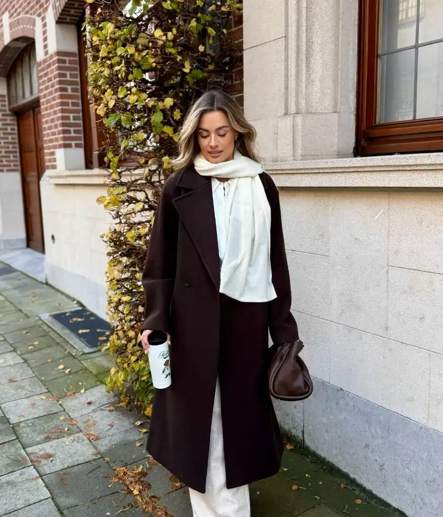 Fall outfit with deep chocolate brown coat and cream layers