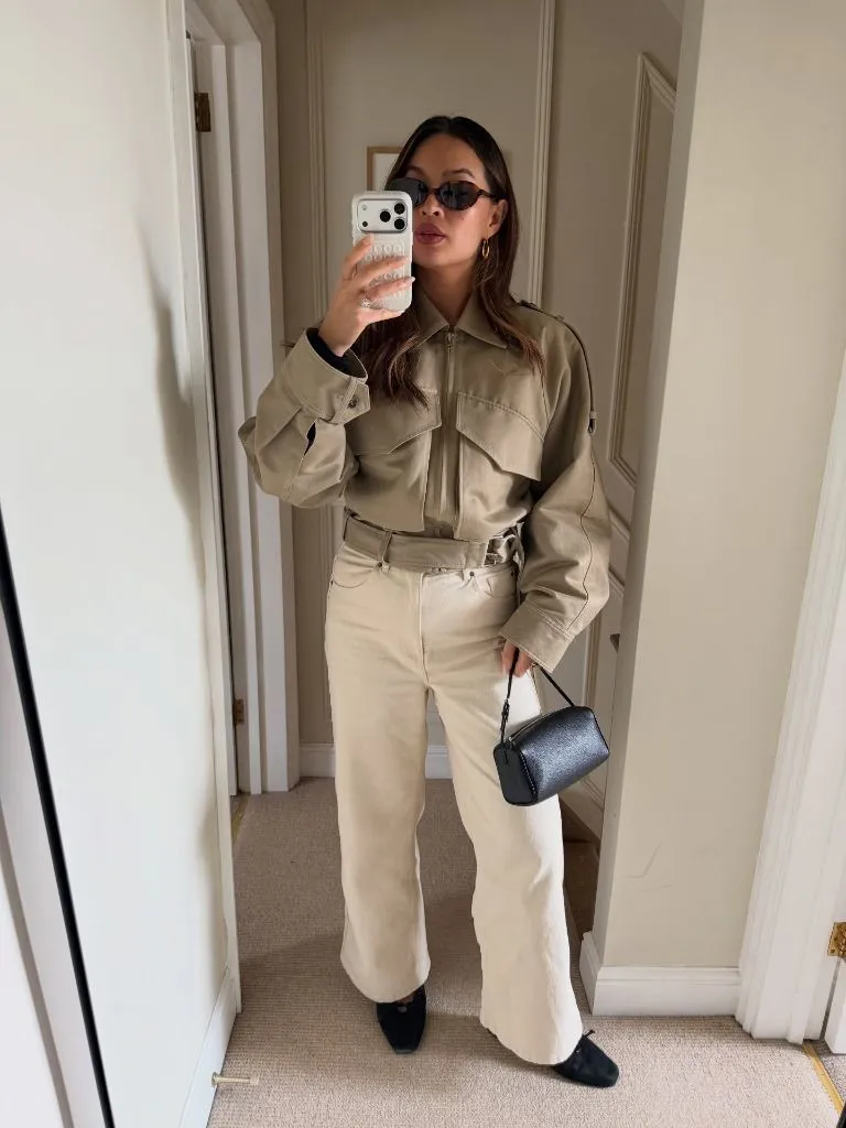 Olive green utility style jacket with cream wide leg pants