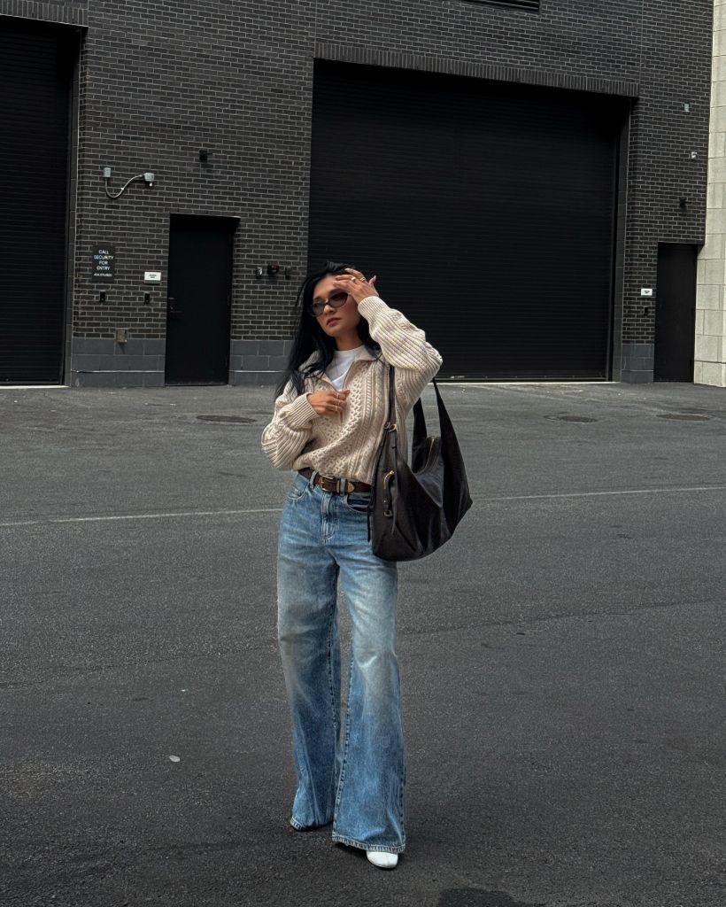 Cable knit cardigan with wide-leg jeans street style