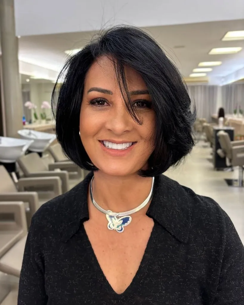 Fall Short Haircuts 2026 Voluminous Black French Bob with Soft Side-Swept Framing