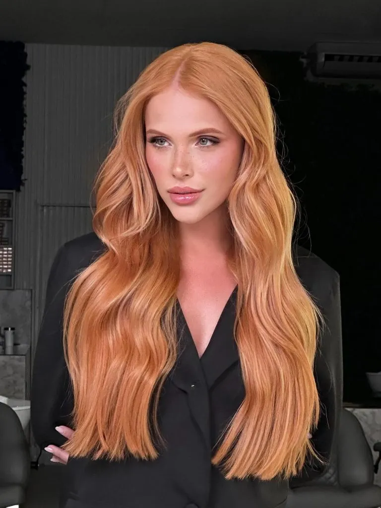 Long wavy strawberry blonde copper hair