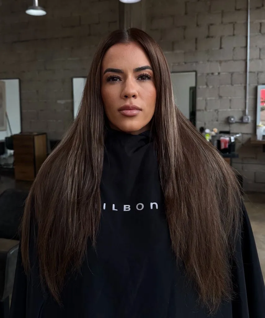 Fall Haircuts for Women 2026 Sleek Chestnut Layers with a Center-Part Curtain Fall