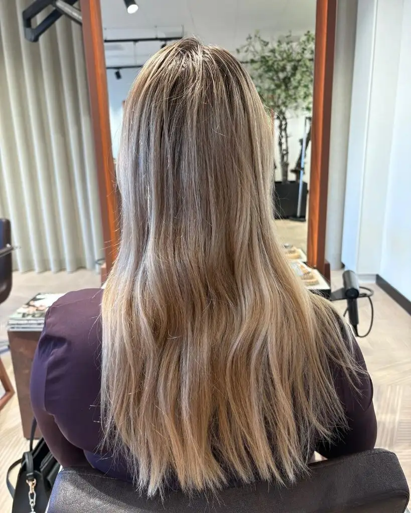 Fall Haircuts for Women 2026 Long Sandy Blonde with Face-Framing Warmth and Gentle Layers