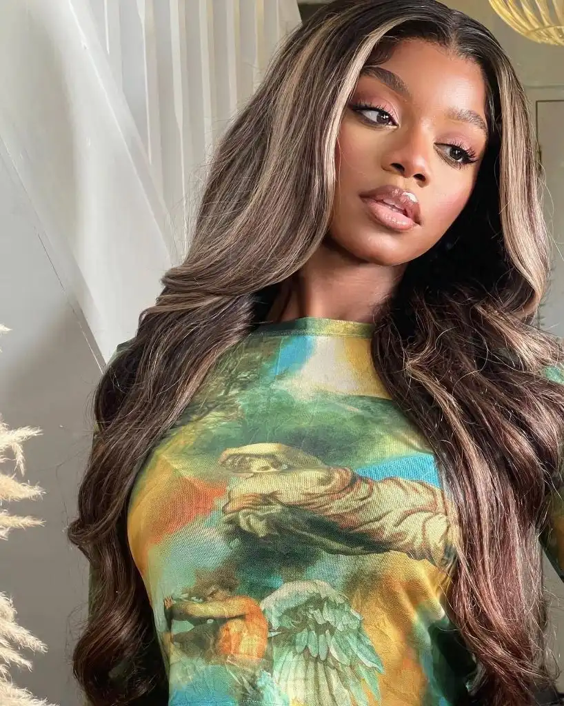 Fall Hair Colors for Black Women 2026 Chestnut Brunette With Warm Caramel Face-Framing Airlights