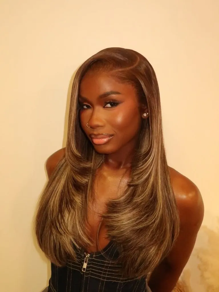 Fall Hair Colors for Black Women 2026 Golden Honey-Brown Layered Blowout With Highlighted Dimension